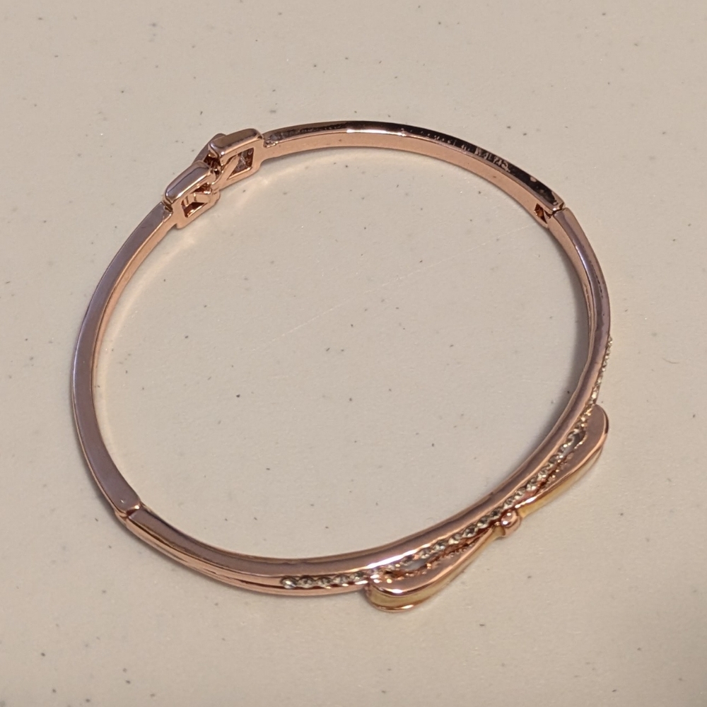 Kate Spade Rose Gold Bangle with Clasp.